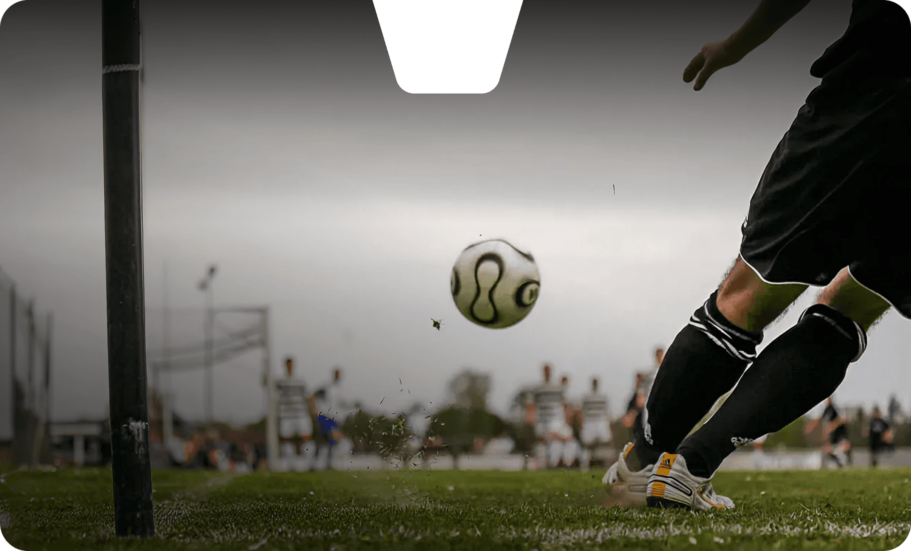 Soccer player kicking a ball